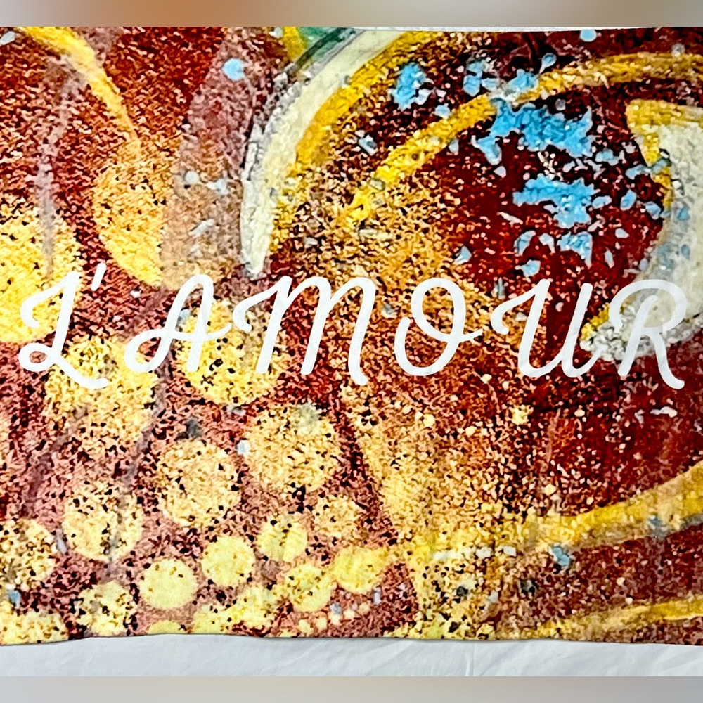 L’amour Throw Blanket - original artwork print as background of a vibrant heart